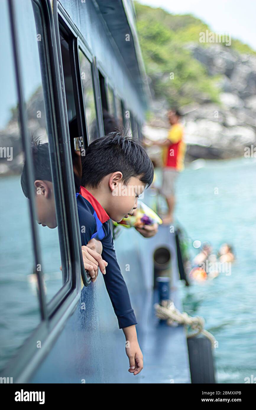 Asia boy boat hi-res stock photography and images - Alamy
