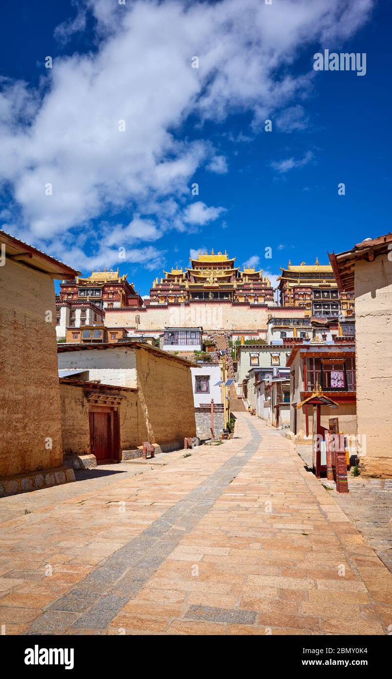 Ganden Sumtsenling Monastery on a sunny day (also known as Sungtseling or Little Potala Palace), Yunnan, China. Stock Photo