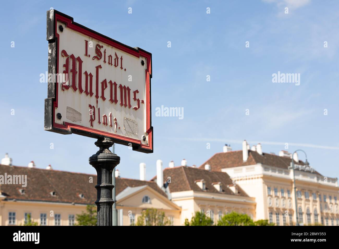 historical iron street sign in the city center of Vienna, saying in german language: museums square Stock Photo