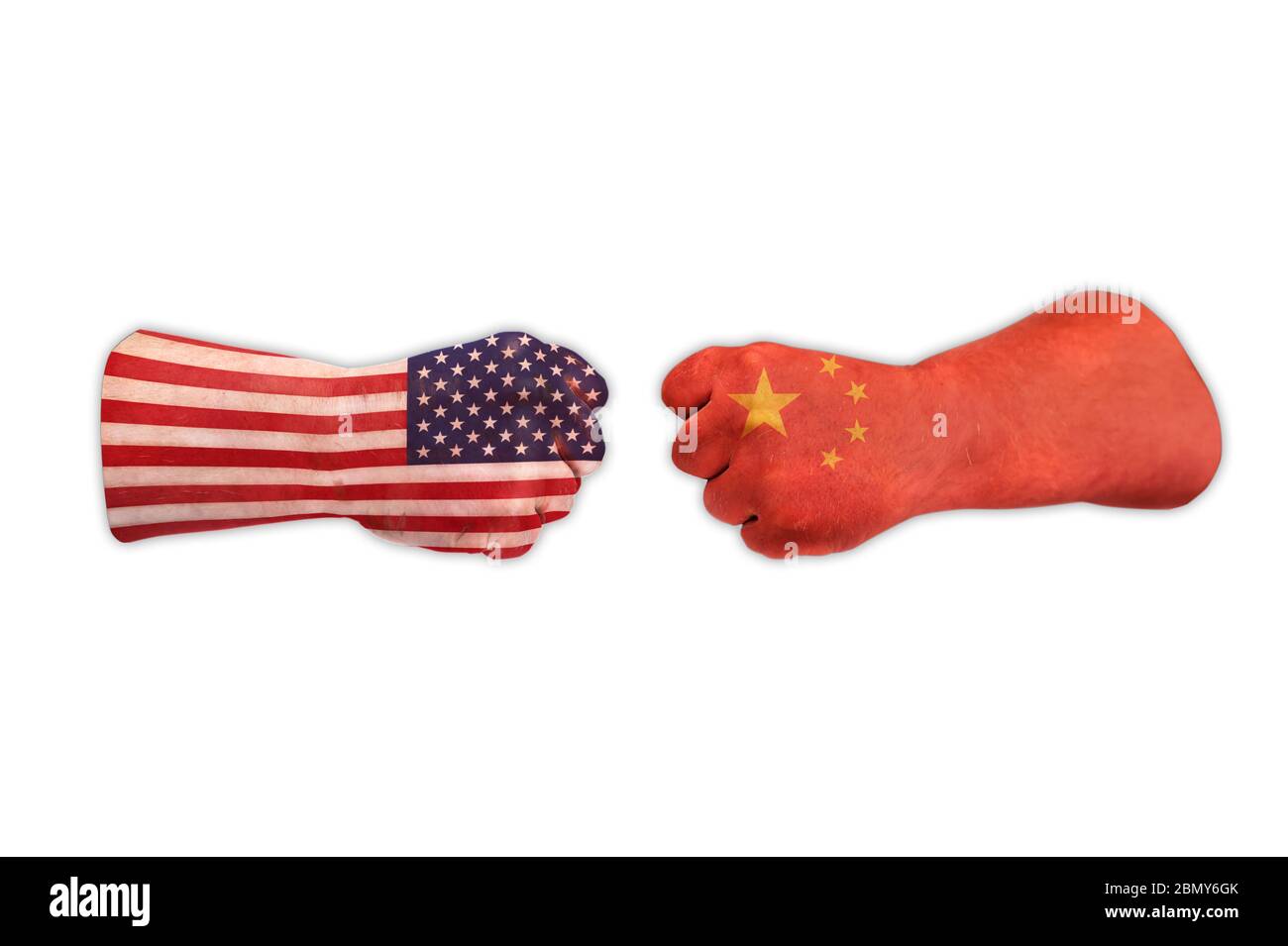 Two fists of a man are painted with body paint. This symbolic picture shows the power struggle between the USA and China. Stock Photo