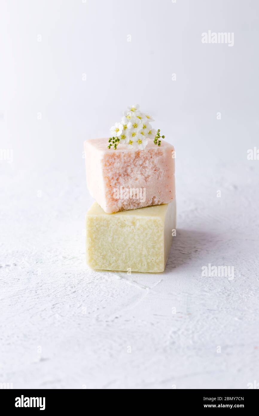A bar of natural soap with flowers. Skin care. Health and beauty. Stock Photo