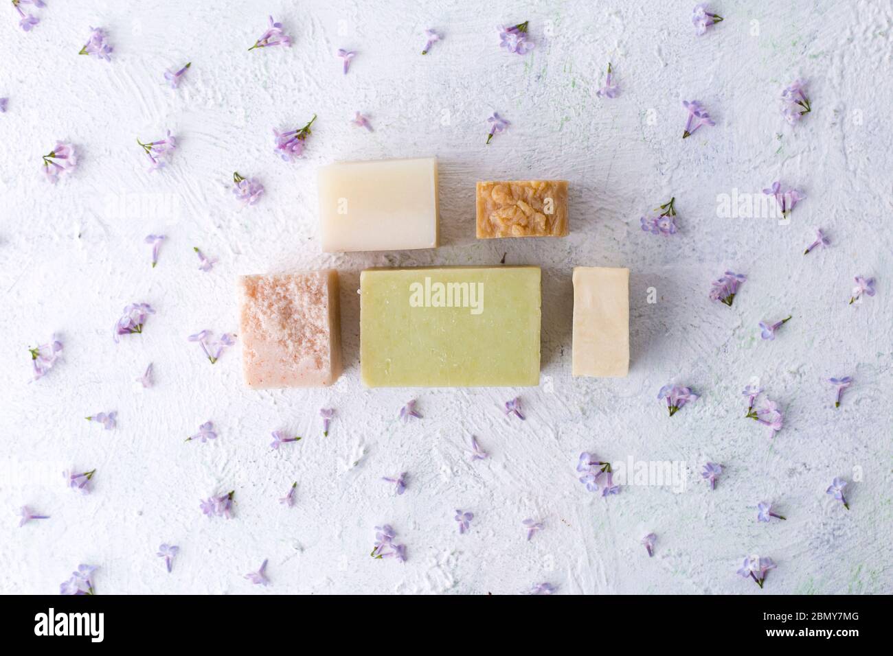 A bar of natural soap with flowers. Skin care. Health and beauty. Stock Photo