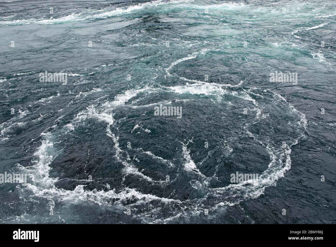 Saltstraumen Maelstrom - which is said to be the world’s strongest tidal currents with whirlpools or Vortices , Bodo, Nordland county, Norway. Stock Photo