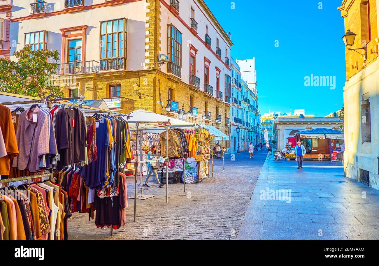 CADIZ, SPAIN - SEPTEMBER 24, 2019: The small market with clothing ...