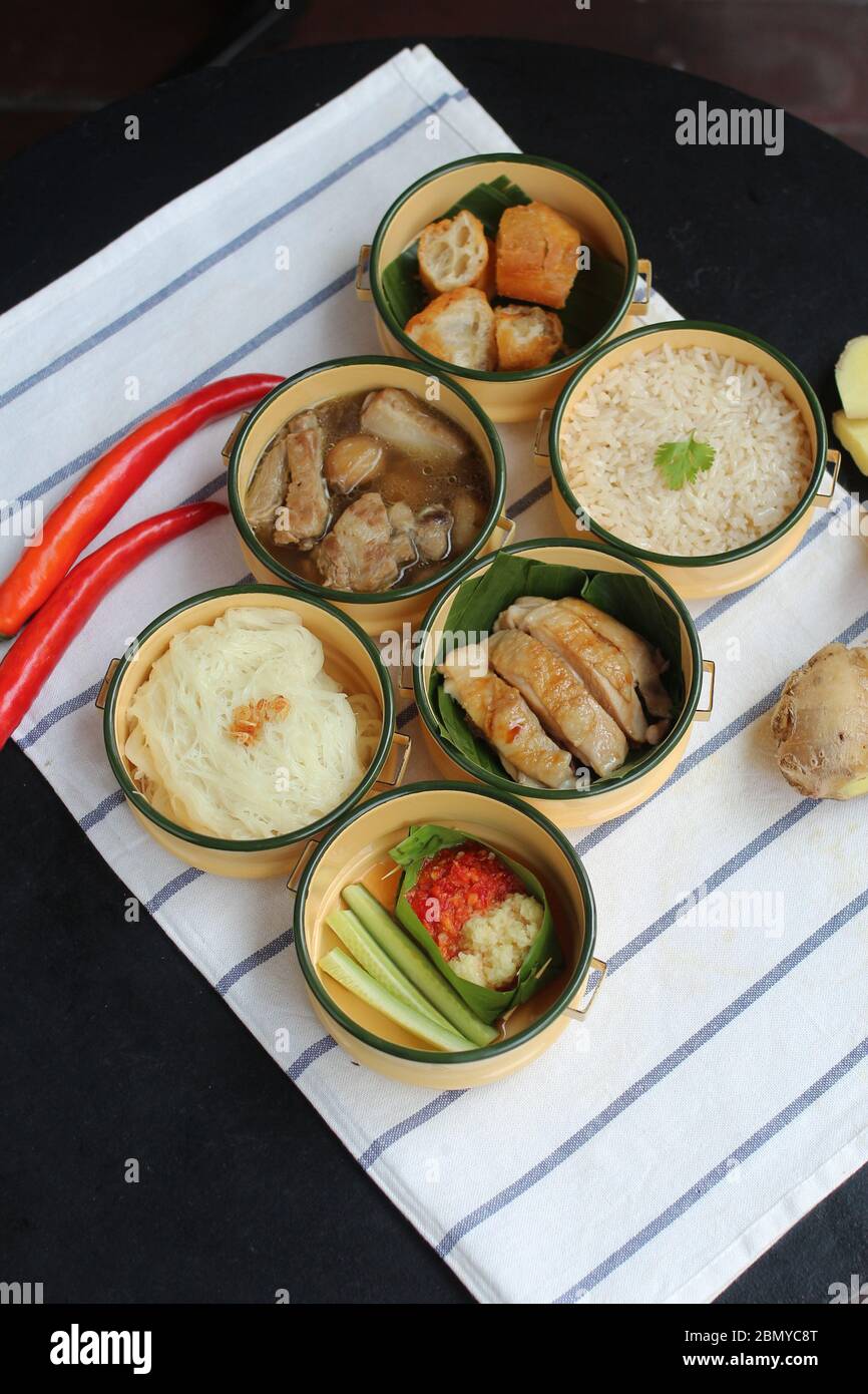 6 healthy cozy warm home dishes in pinto lunch box top view on table