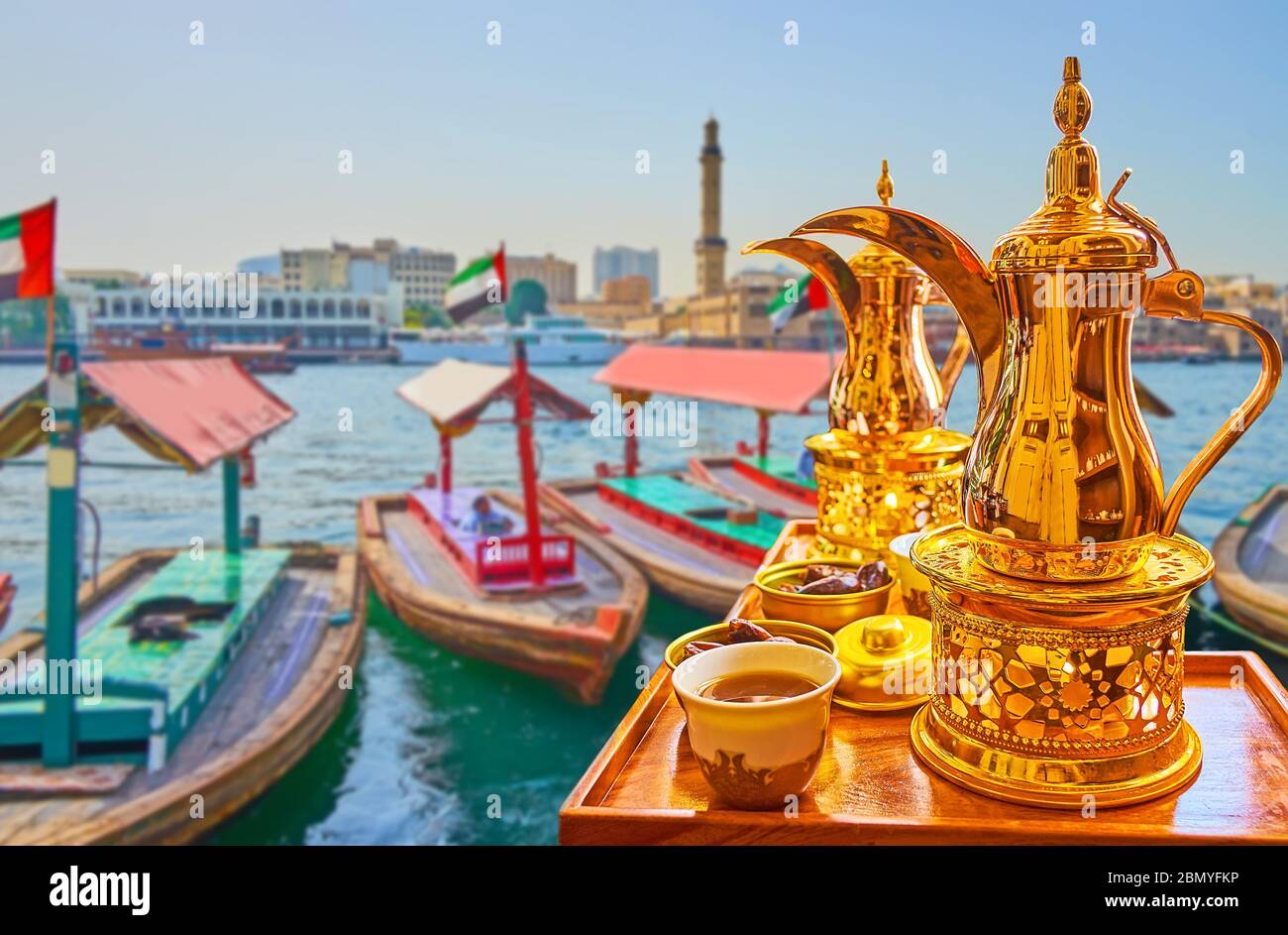 Enjoy hot coffee from traditional Arabic brass dallah coffee pot at the