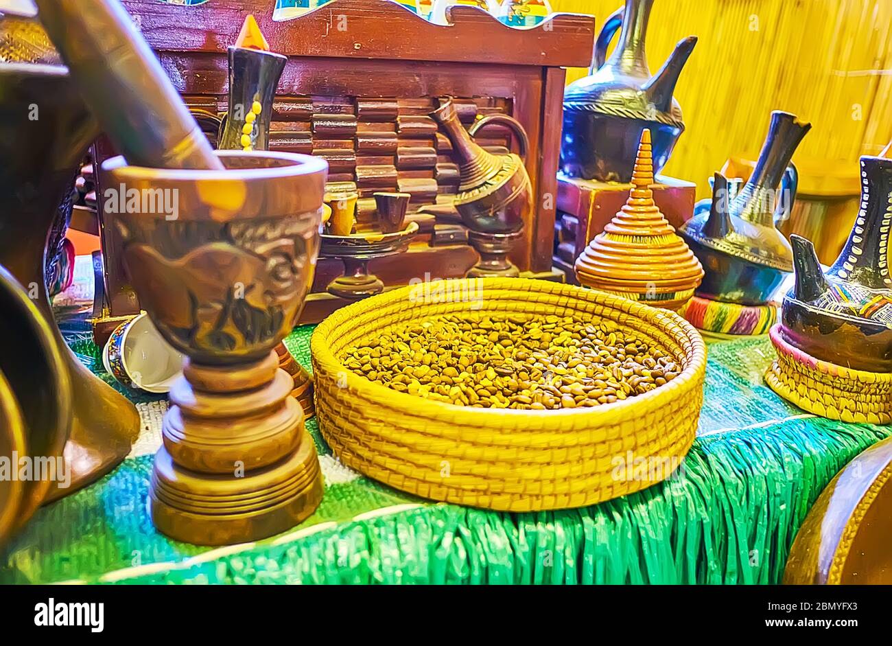 The cookware for Ethiopian coffee ceremony woven bowl with raw coffee