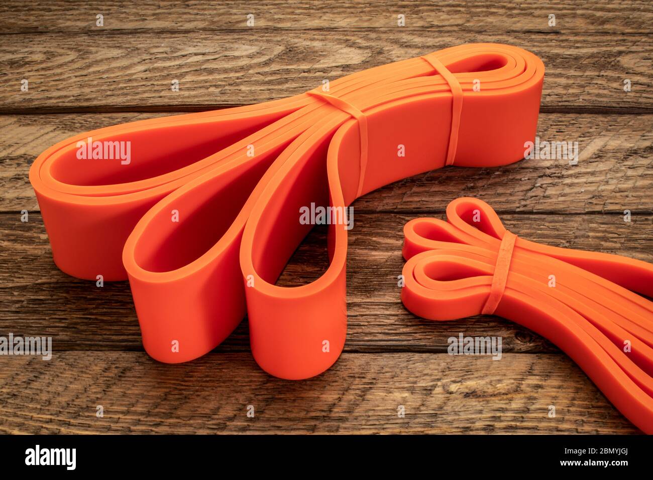 resistance exercise band for fitness and rehabilitation against wooden