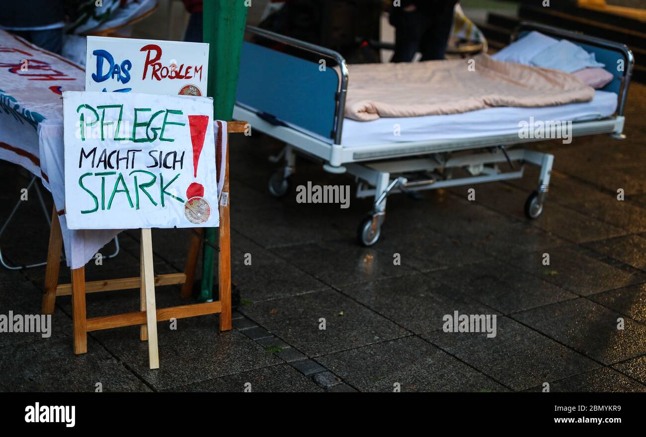 Stuttgart, Germany. 11th May, 2020. 'Care makes itself strong' is written on a sign at the 24-hour vigil 'Walk of Care' on the Schlossplatz. The participants want to draw attention to abuses in care. Credit: Christoph Schmidt/dpa/Alamy Live News Stock Photo