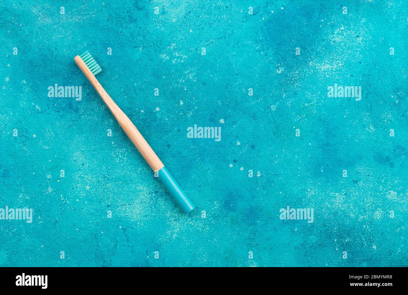 Eco friendly teeth hygiene oral dental care product on turquoise background with copy space