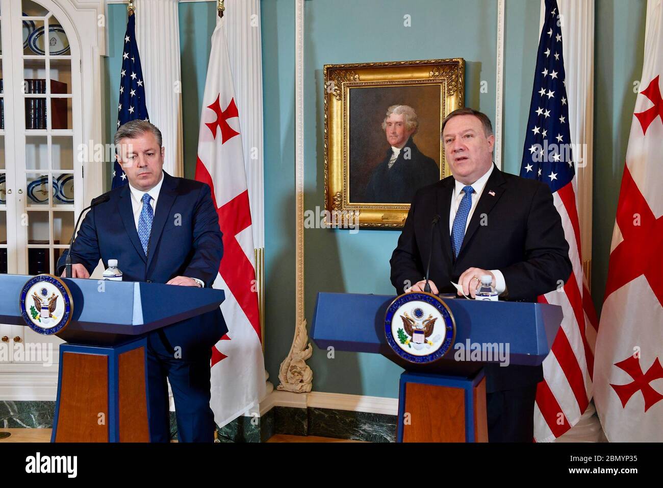 Secretary Pompeo Delivers Remarks at the 2018 Plenary Session of the U.S.-Georgia Strategic Partnership Commission U.S. Secretary of State Mike Pompeo, flanked by Georgian Prime Minister Giorgi Kvirikashvili delivers remarks at the 2018 Plenary Session of the U.S.-Georgia Strategic Partnership Commission at the U.S. Department of State in Washington, D.C., on May 21, 2018. Stock Photo