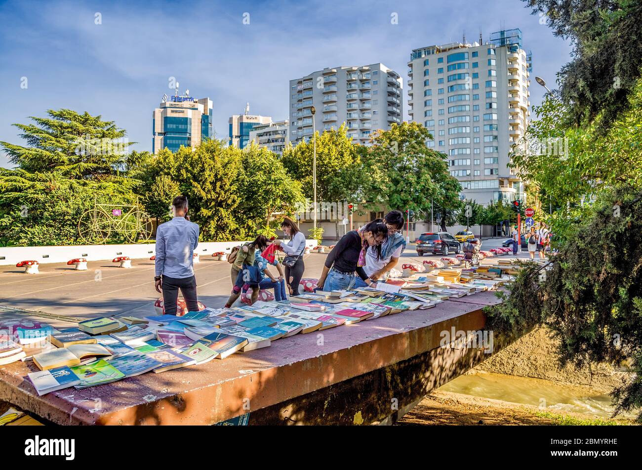 Open-air book sales on the bridge over canal at Ibrahim Rugova street. Tirana city center,  Albania. Stock Photo