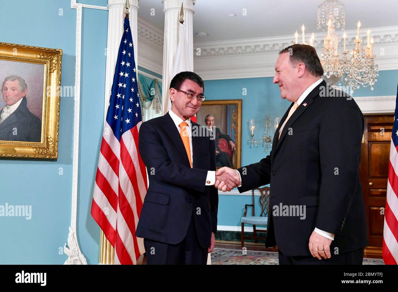 Secretary Pompeo meets Greets Japanese Foreign Minister Kono Secretary of State Mike Pompeo greets Japanese Foreign Minister Taro Kono before their meeting at the Department of State, Washington, June 6, 2018. Stock Photo