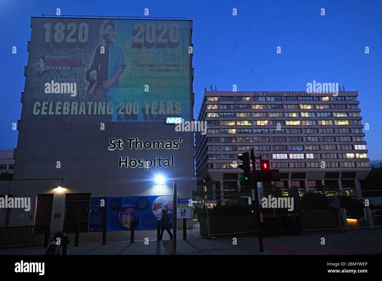 An image of Florence Nightingale is projected on to Guy's and St Thomas' hospital in London to mark the 200th anniversary of the birth of the nurse. Stock Photo