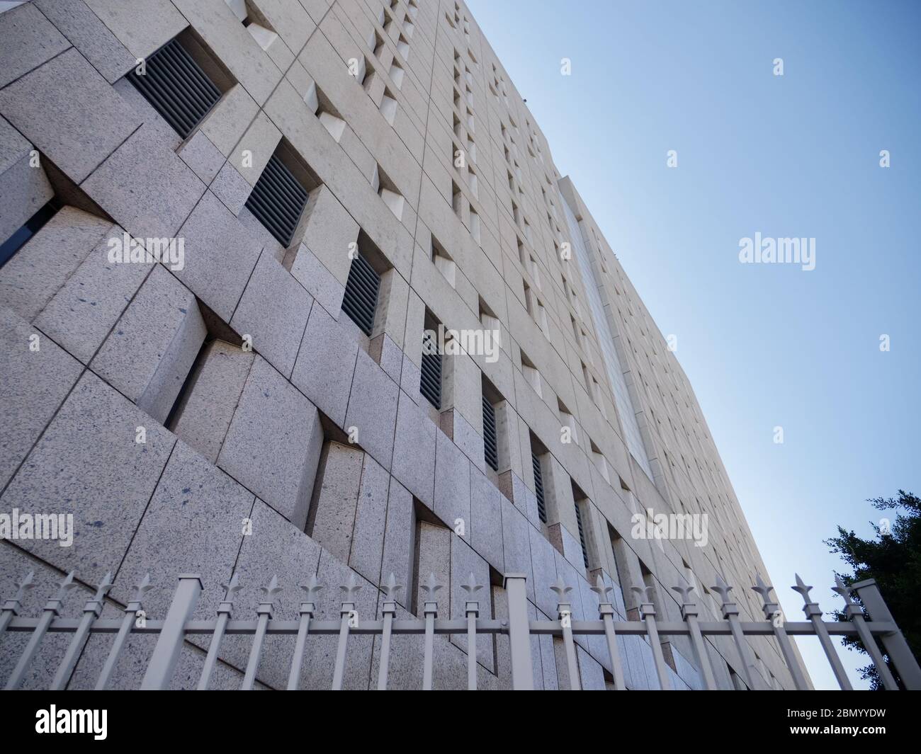 Prison Correctional Facility with Fence Low Angle Stock Photo