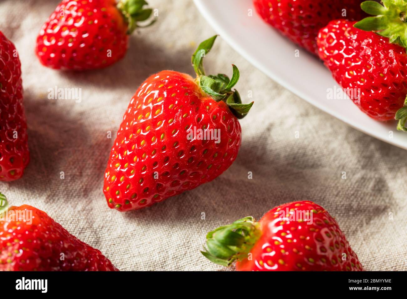 Raw Red Organic Strawberries in a Bunch Stock Photo - Alamy