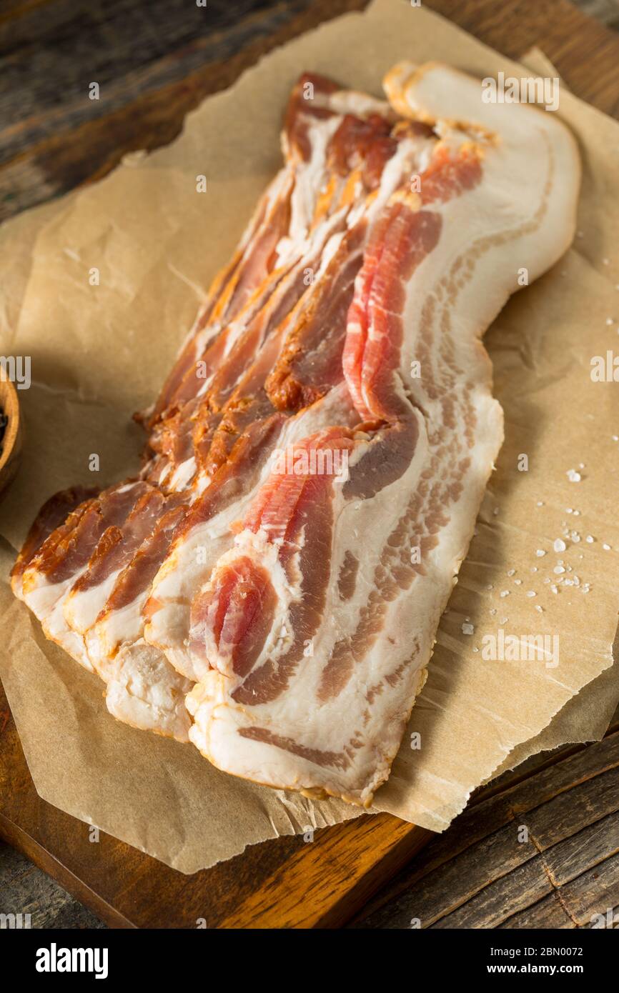 Raw Organic Uncured Salty Bacon Ready to Cook Stock Photo