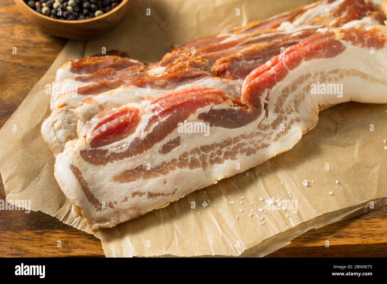 Raw Organic Uncured Salty Bacon Ready to Cook Stock Photo