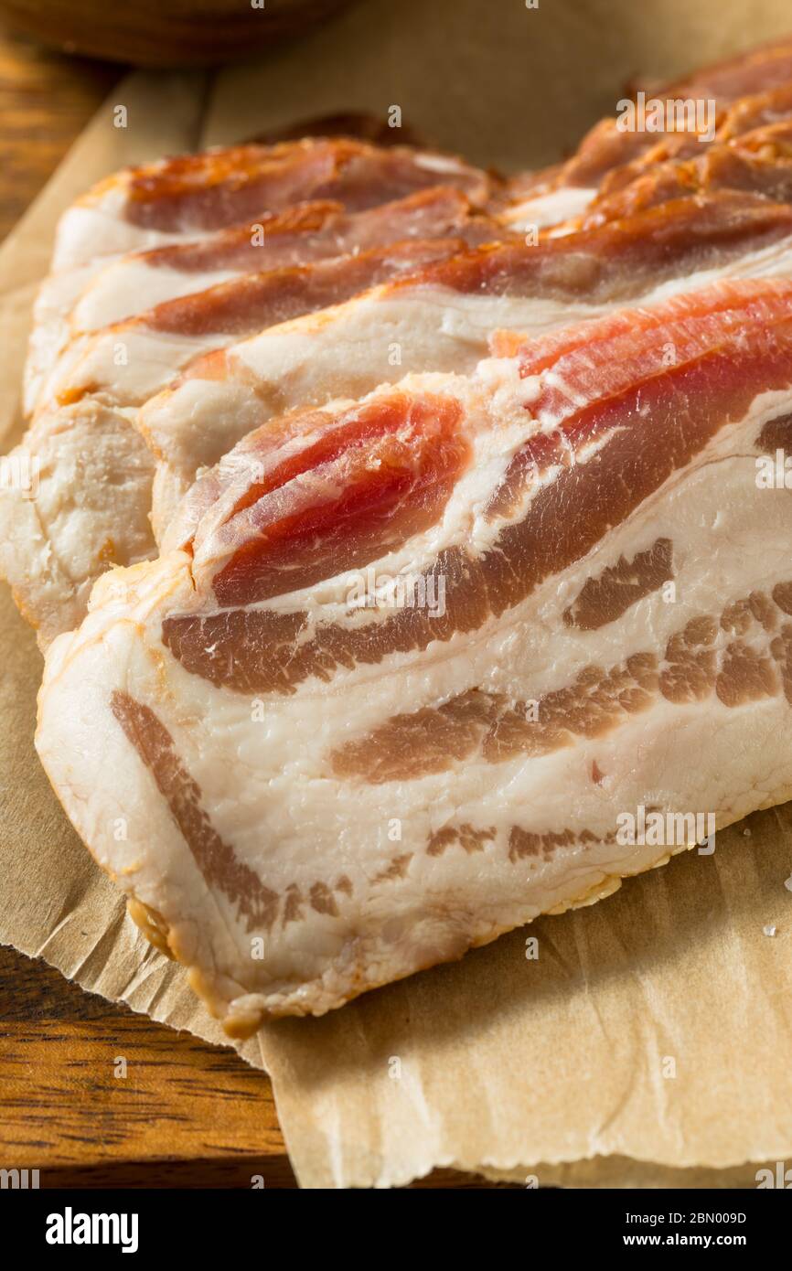 Raw Organic Uncured Salty Bacon Ready to Cook Stock Photo