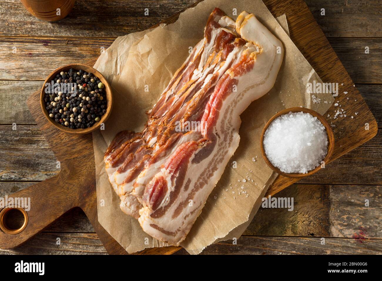 Raw Organic Uncured Salty Bacon Ready to Cook Stock Photo