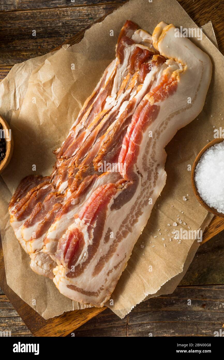 Raw Organic Uncured Salty Bacon Ready to Cook Stock Photo