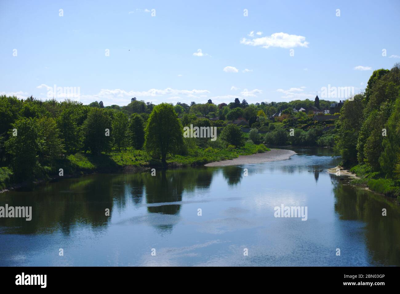 View west from Coldstream Bridge of the River Tweed, which marks the border between Scotland and England at this point Stock Photo