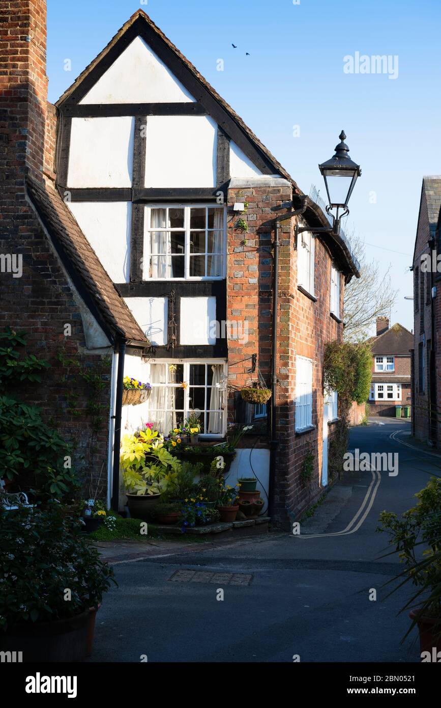 A timber framed and brick cottage on the narrow thorouhfare of Talbot Lane in the centre of the market town of Horsham, West Sussex, UK Stock Photo