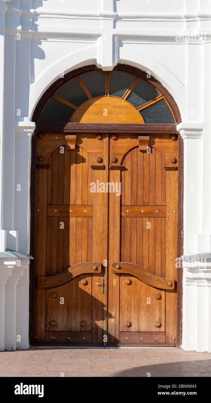Ancient Gothic Church Portal Carved Wooden Door Church. Large Brown