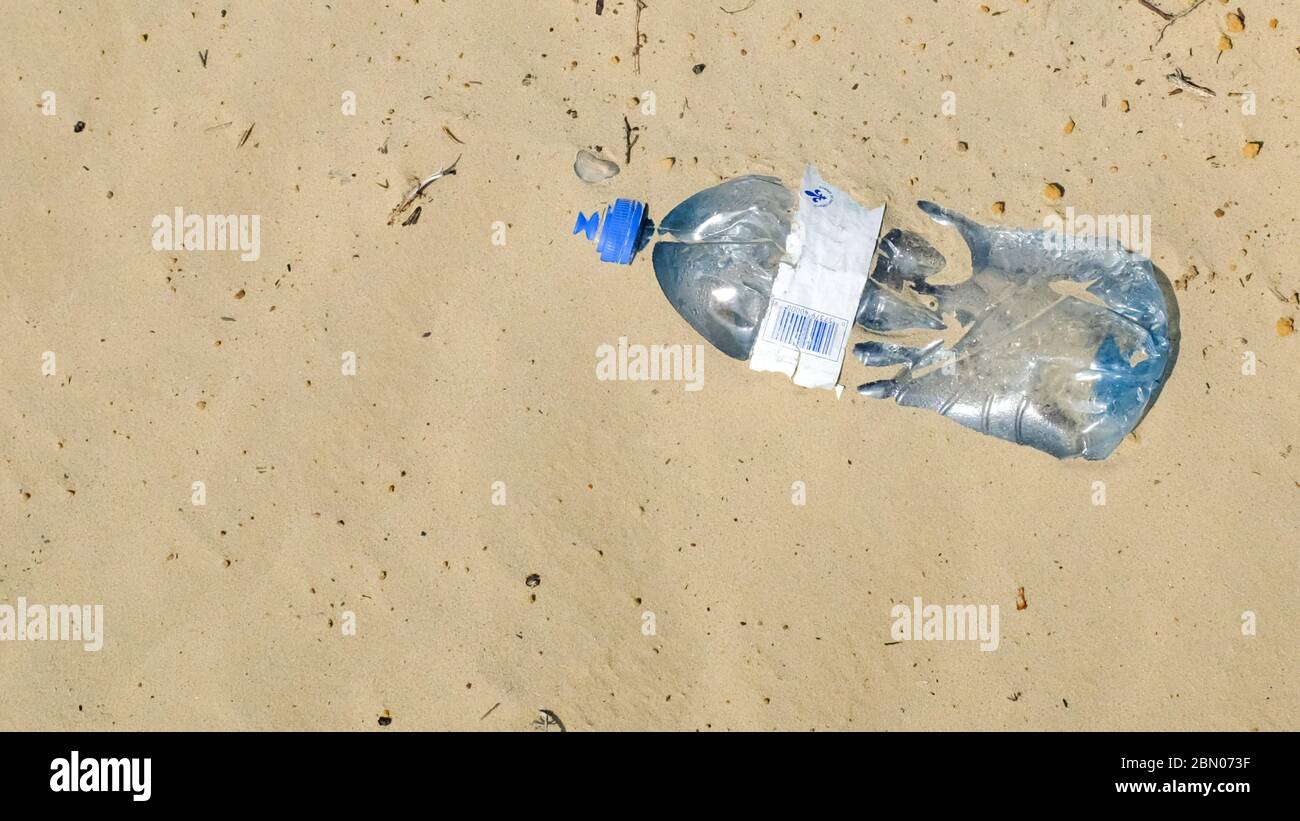 Plastic bottle thrown away Stock Photo Alamy