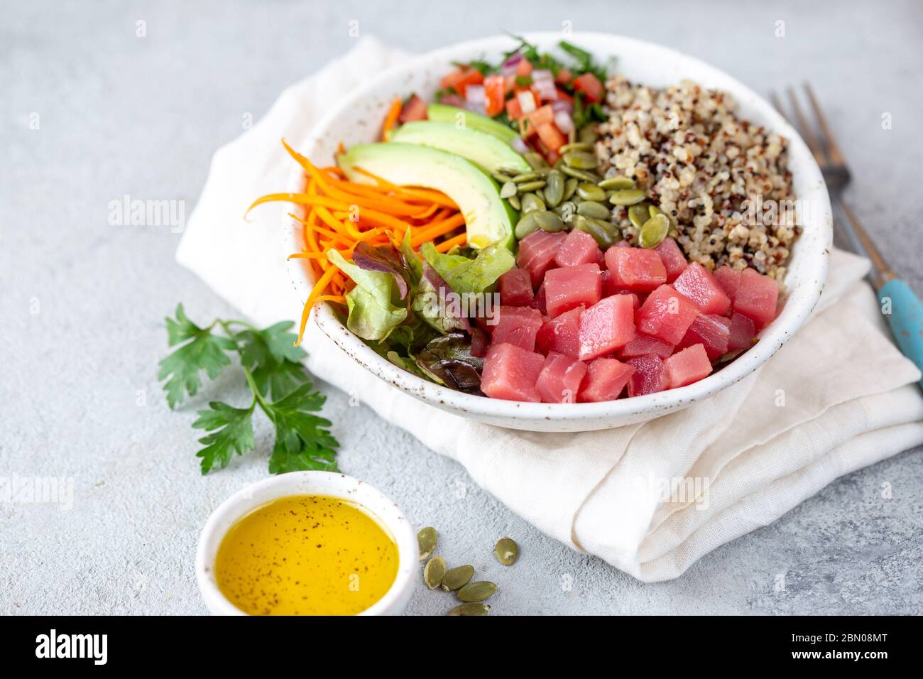 Healthy raw tuna bowl with quinoa and vegetales. Buddha bowl Stock