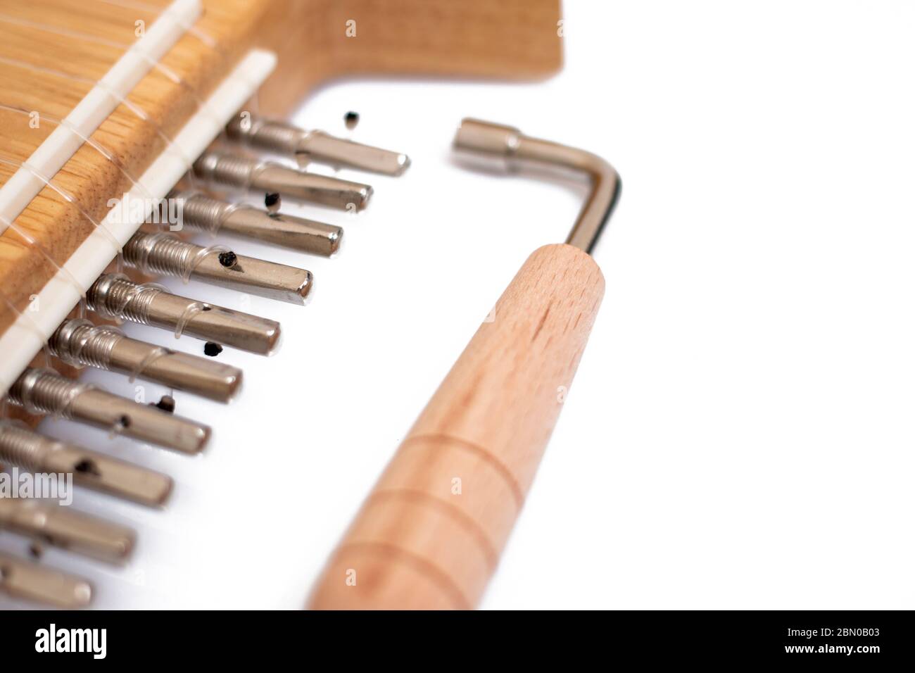 tuning tool for stringed musical instruments isolated on a white