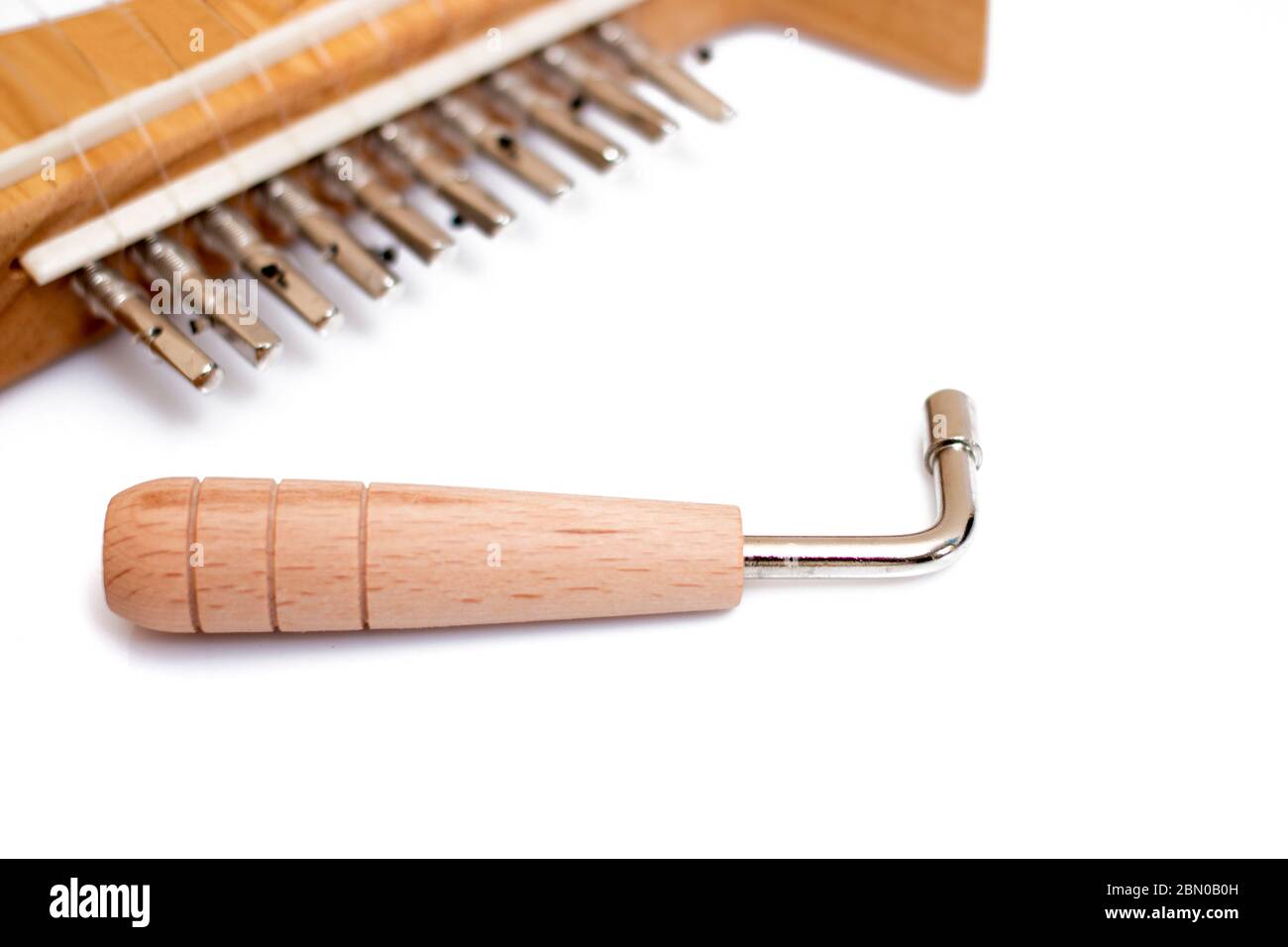 tuning tool for stringed musical instruments isolated on a white