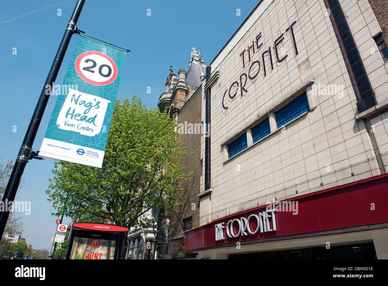 The Coronet Public House with 20 mph sign and Nags Head Town Centre banner, Holloway Road, London Borough of Islington, England Britain UK Stock Photo