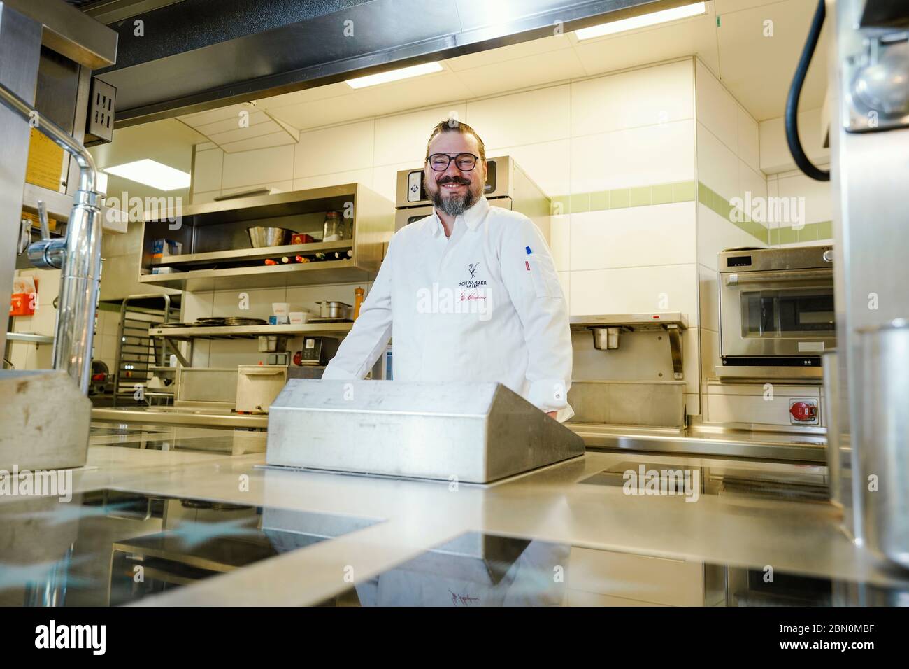 Deidesheim, Germany. 09th May, 2020. Stefan Neugebauer, head chef, is in the kitchen at the restaurant and hotel 'Deidesheimer Hof'. (to dpa 'Partition walls and flutter band - restaurants and pubs in starting blocks') Credit: Uwe Anspach/dpa/Alamy Live News Stock Photo