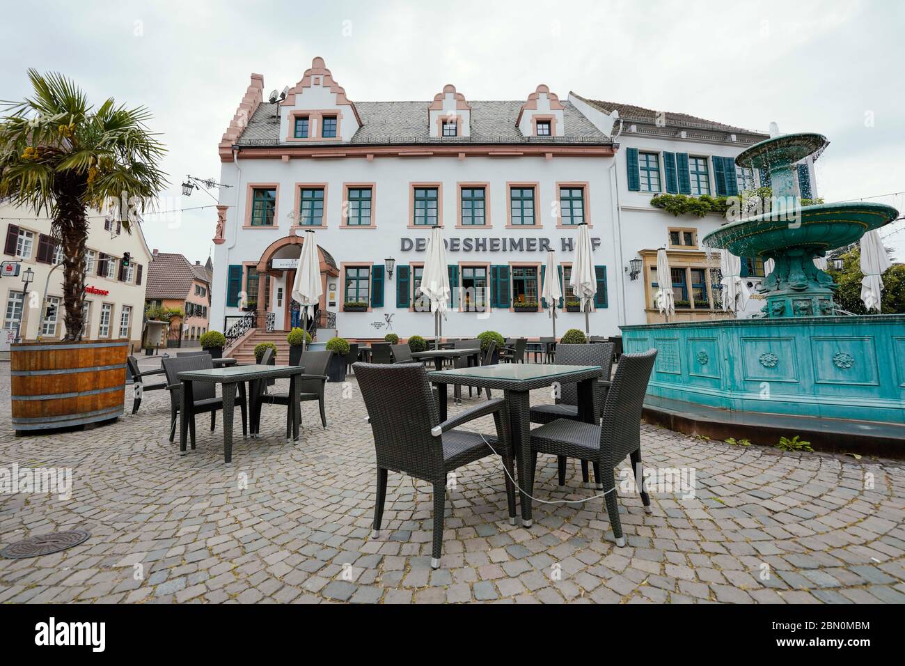 Deidesheim, Germany. 09th May, 2020. Chairs can be found outside in front of the restaurant and hotel 'Deidesheimer Hof'. (to dpa 'Partition walls and flutter band - restaurants and pubs in starting blocks') Credit: Uwe Anspach/dpa/Alamy Live News Stock Photo