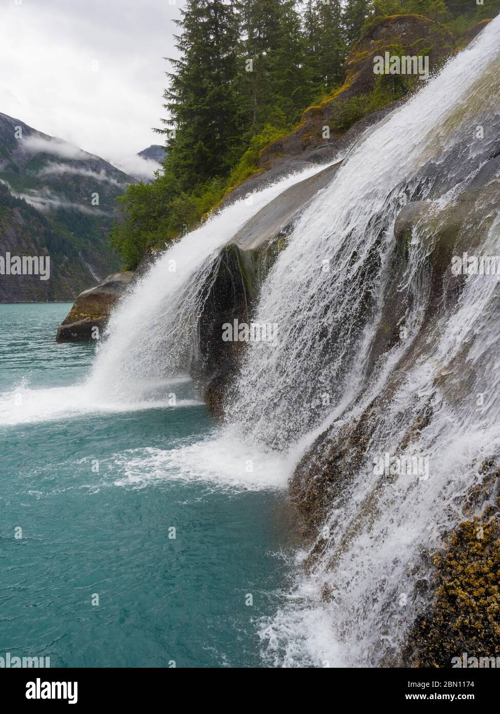 Waterfall in Tracy Arm.  Southeast, Alaska Stock Photo