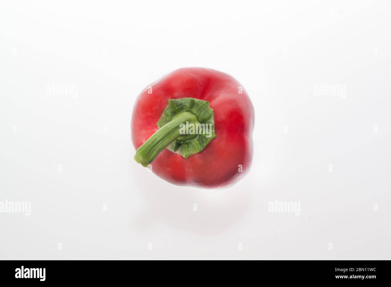 Red Bell pepper isolated on white background Stock Photo - Alamy