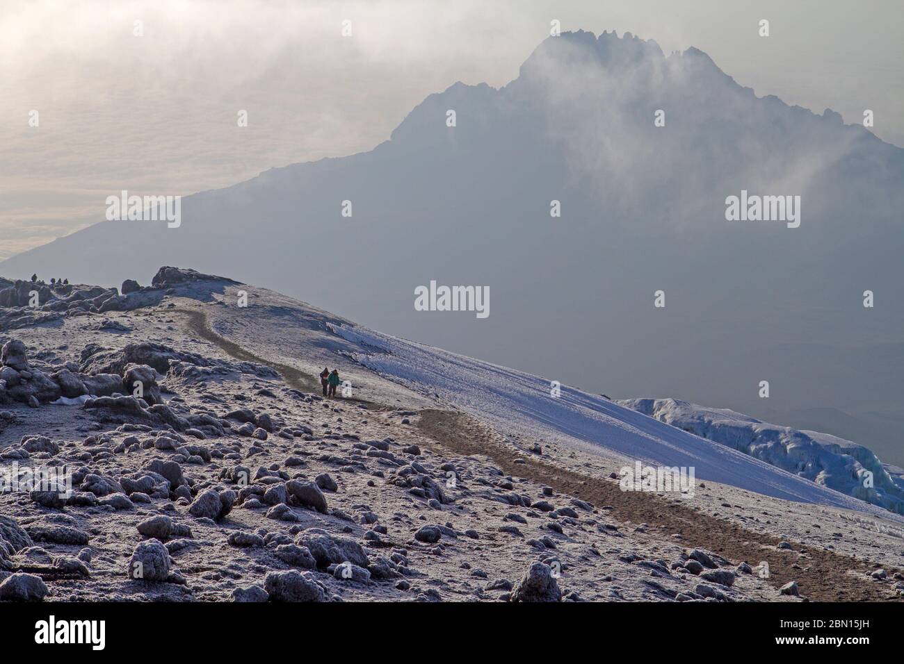 Trekkers on the summit rim of Mt Kilimanjaro Stock Photo