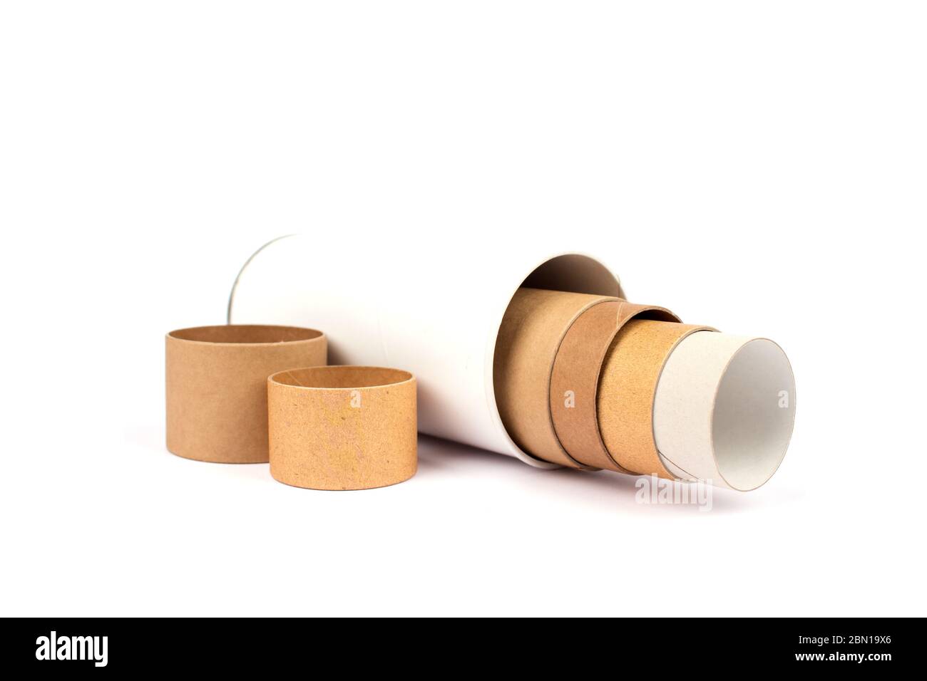 Set of white and brown paper tubes with paper end caps and metal plugs,  cardboard containers for packaging isolated on white background with  copyspace Stock Photo - Alamy