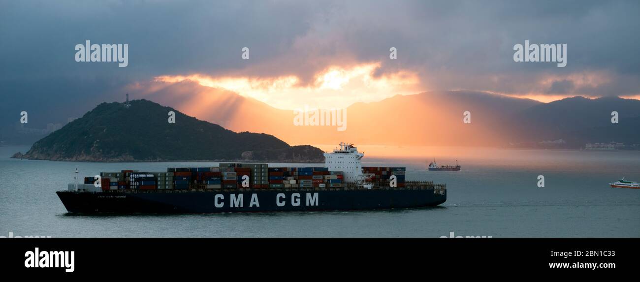 Container ships transporting cargo into Hong Kong from mainland China