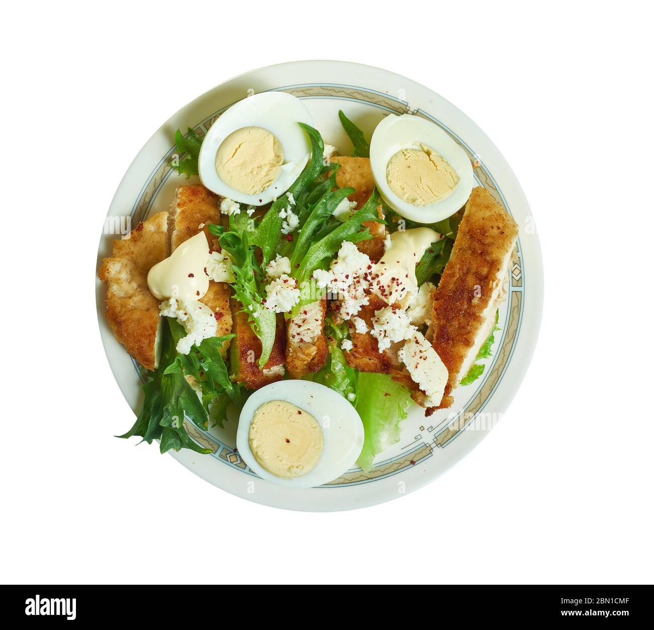 Chicken schnitzel Caesar, Crunchy, munchy schnitzel and creamy, crispy caesar salad Stock Photo