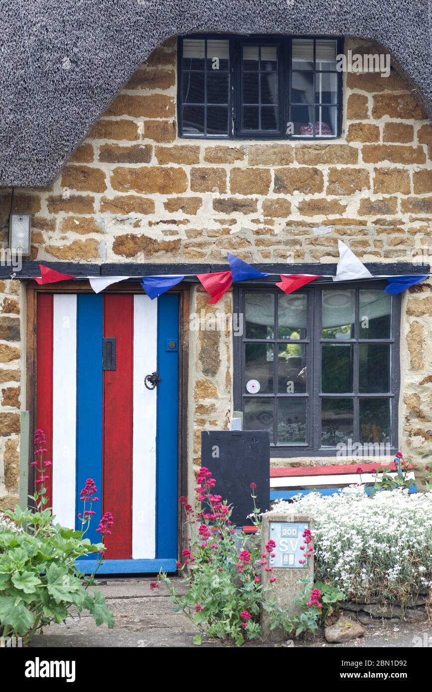 wooden door painted red white and blue for V E Day 2020 Stock Photo