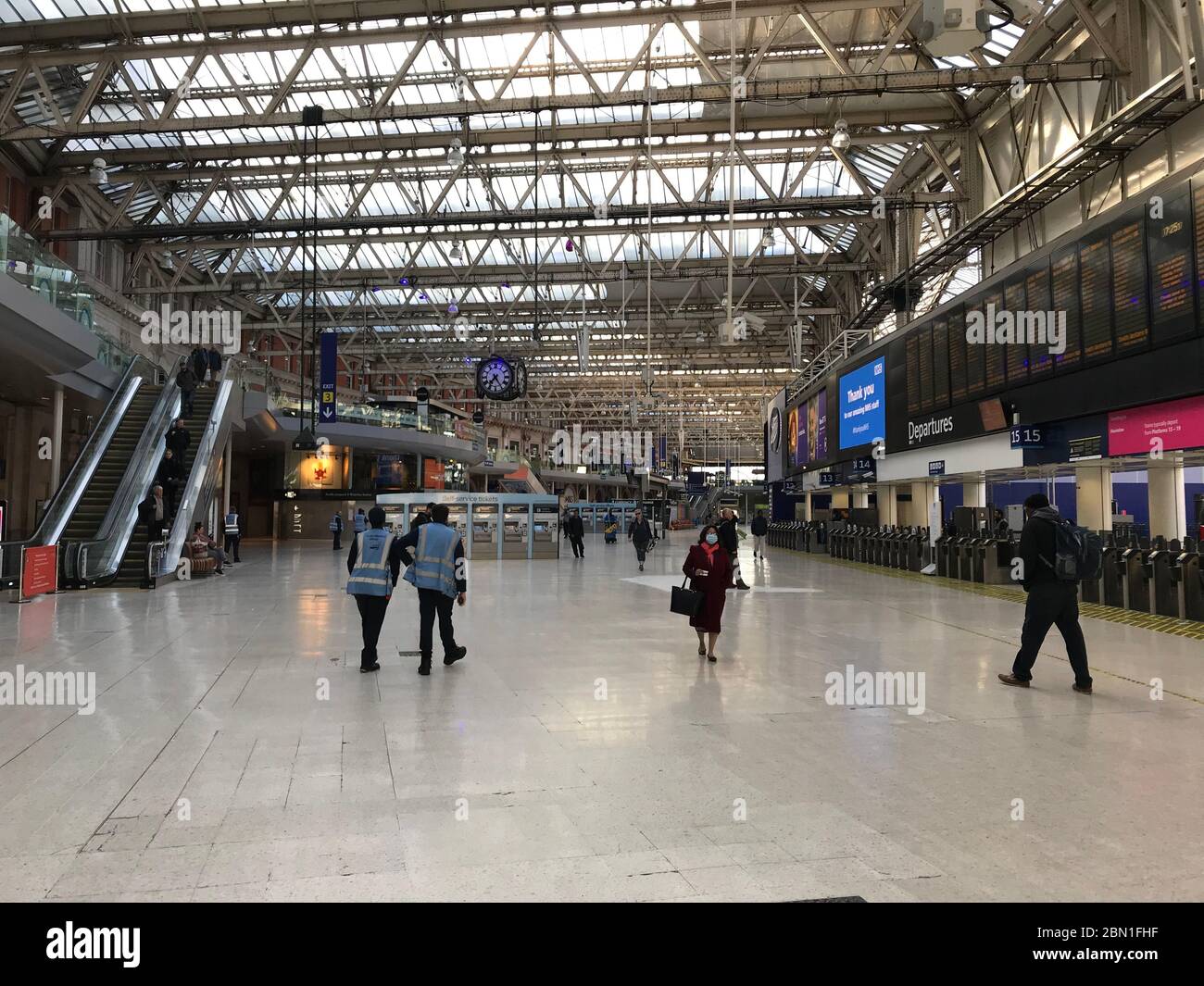 Commuters at Waterloo Station in London during rush hour on Monday morning. Commuters say they are worried about having to travel on busier trains as some returned to work following the easing of coronavirus lockdown measures. Stock Photo