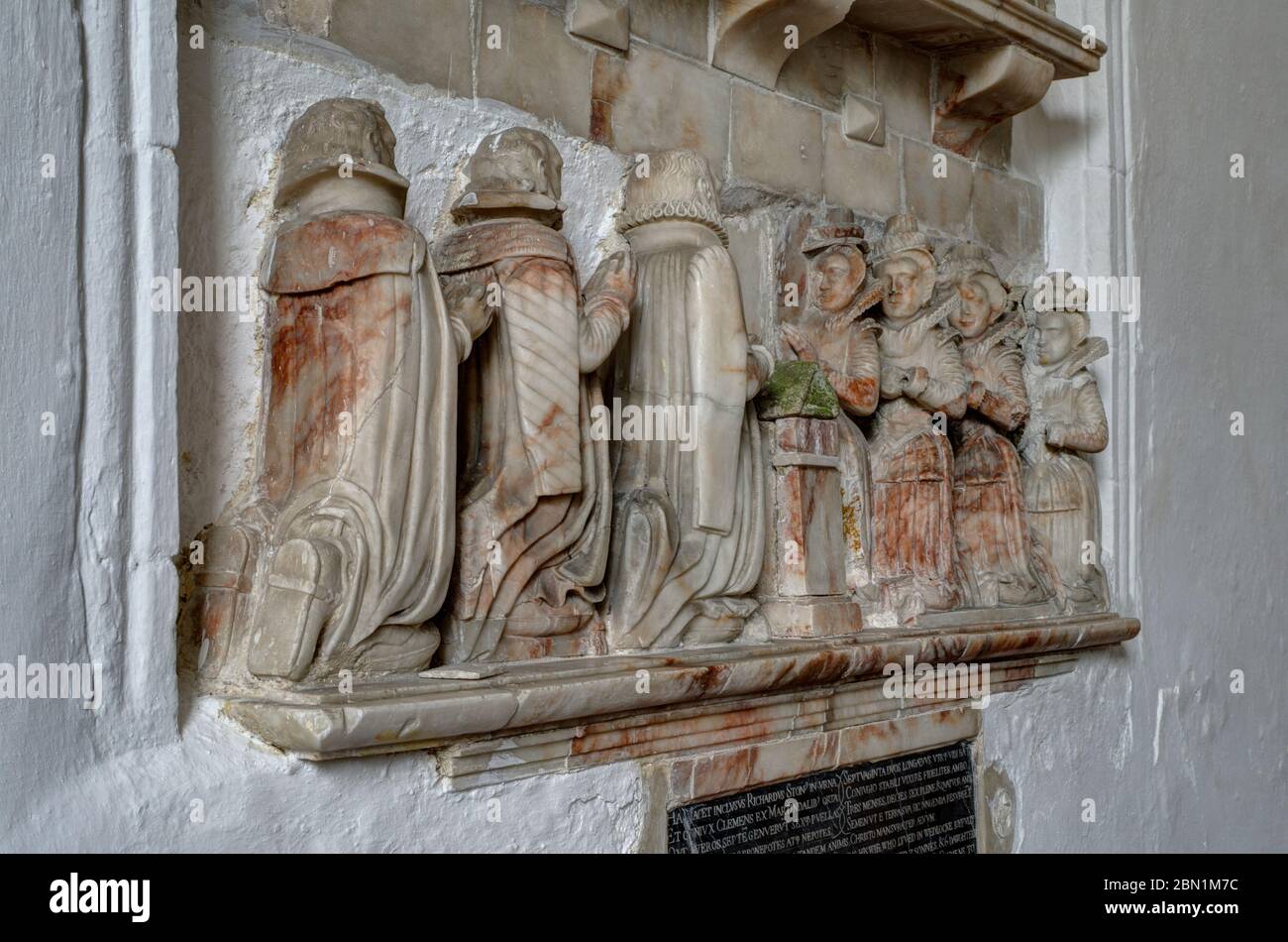 Carved stone memorial in the church of St Mary the Virgin in the village of Holme Next The Sea, Norfolk, UK Stock Photo