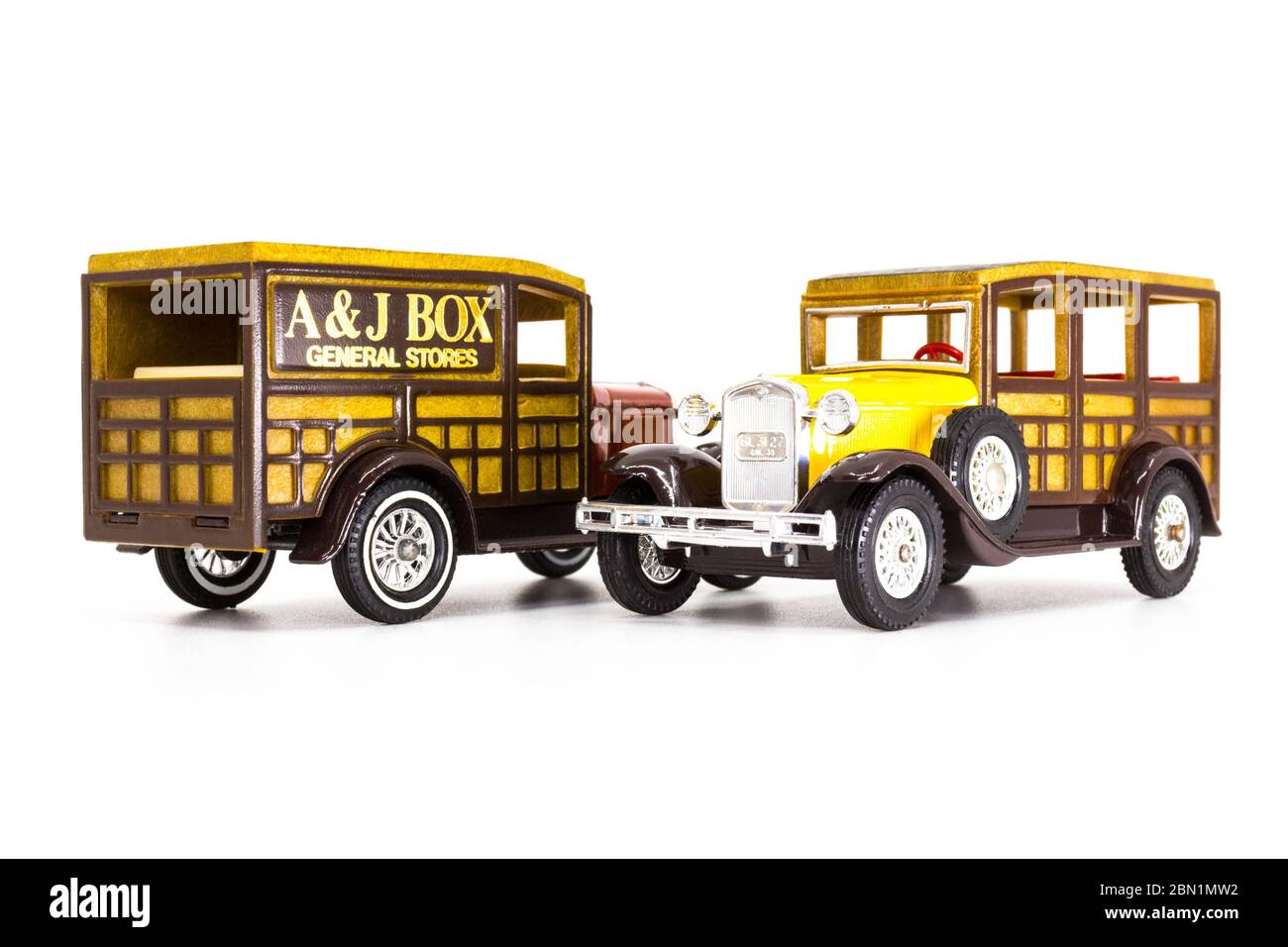 Matchbox Models of Yesteryear Y-21 Ford Model A Woody Wagon 1930. Two versions: yellow bus, and orange van. Stock Photo