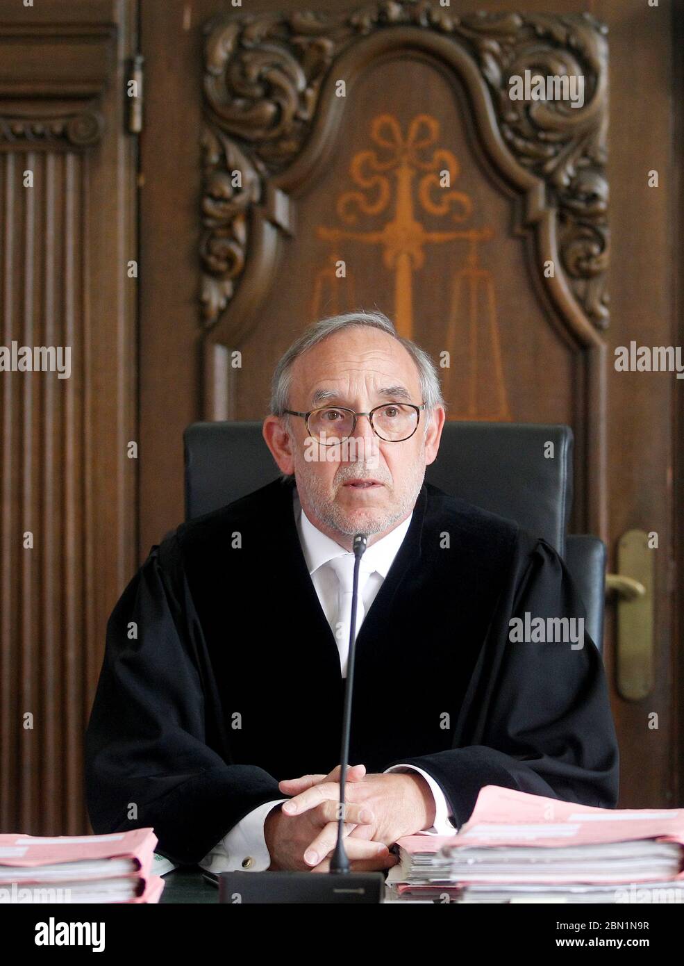 Moers, Germany. 12th May, 2020. The presiding judge Johannes Huismann opens the trial in the abuse case Bergisch Gladbach against the accused soldier. He is alleged to have abused small children in a total of 33 cases, some of them severely and twice together with a chat partner. Credit: Roland Weihrauch/dpa/Alamy Live News Stock Photo
