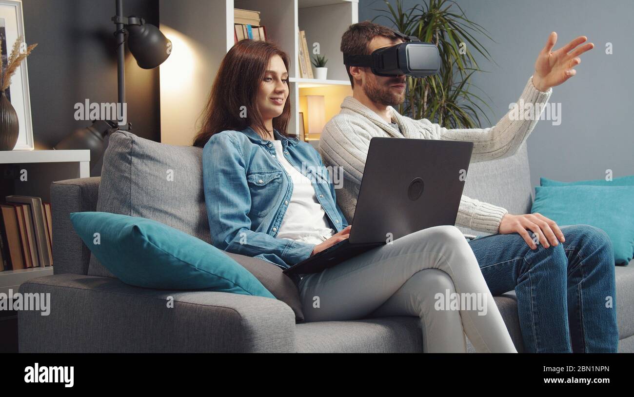Couple having fun with VR-glasses Stock Photo