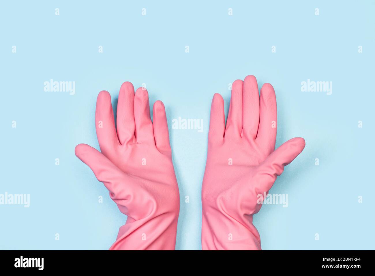 Pink rubber gloves hi-res stock photography and images - Alamy
