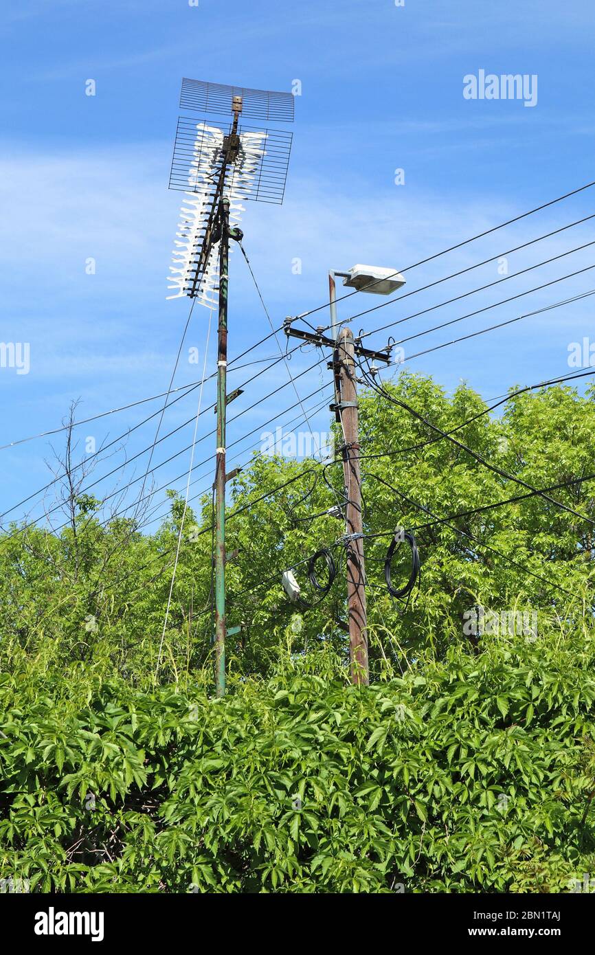 Television antennas and street light Stock Photo Alamy