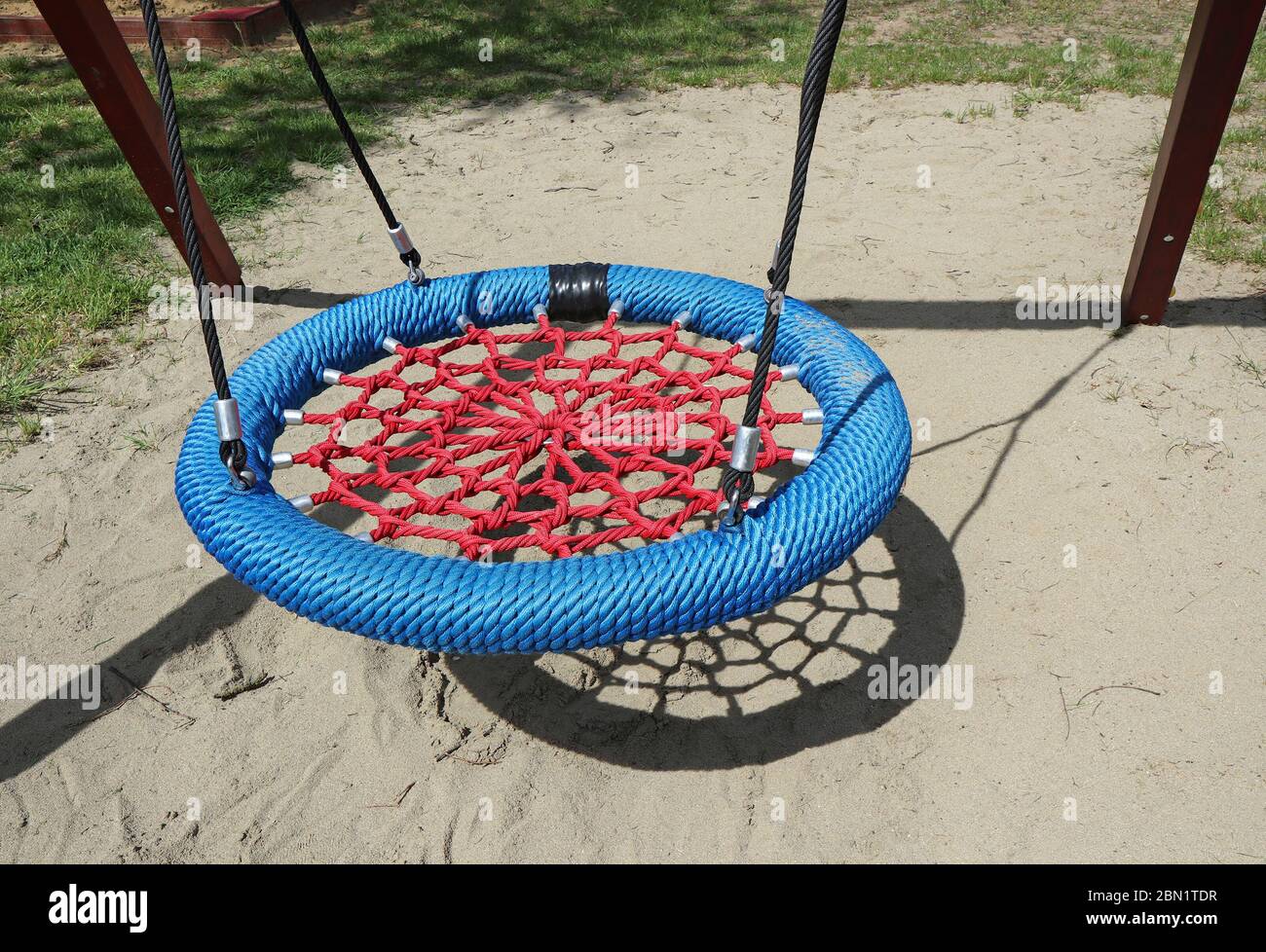 Rope swing at the playground Stock Photo - Alamy